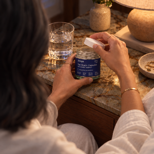 The Brain Capsules for Sleep Support - opening the jar on the bedside table